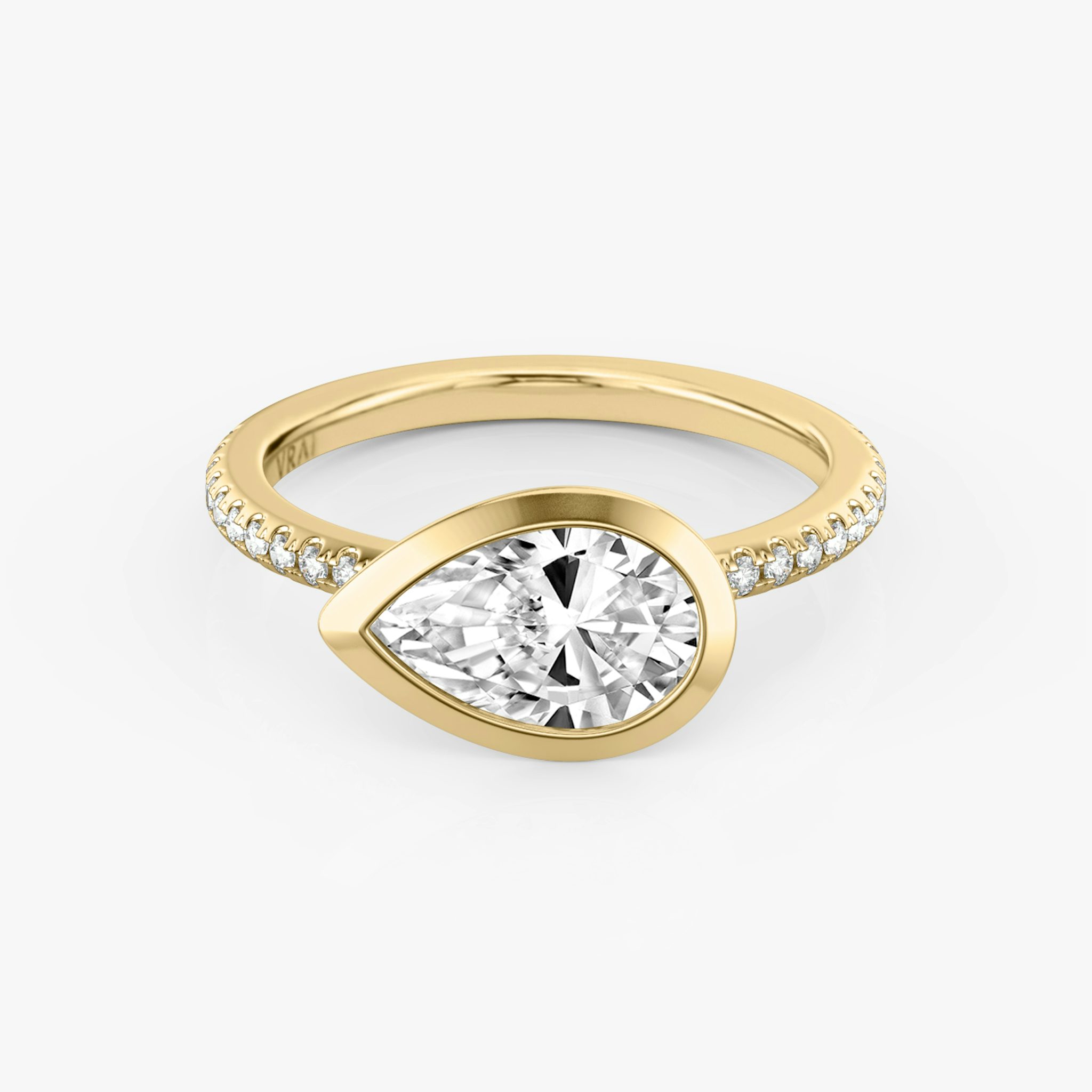 The Signature Bezel | Pear | 18k | Yellow Gold | bandAccent: Pavé | diamondOrientation: horizontal | caratWeight: other