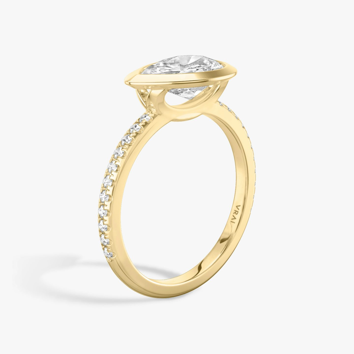 The Signature Bezel | Pear | 18k | Yellow Gold | bandAccent: Pavé | diamondOrientation: horizontal | caratWeight: other