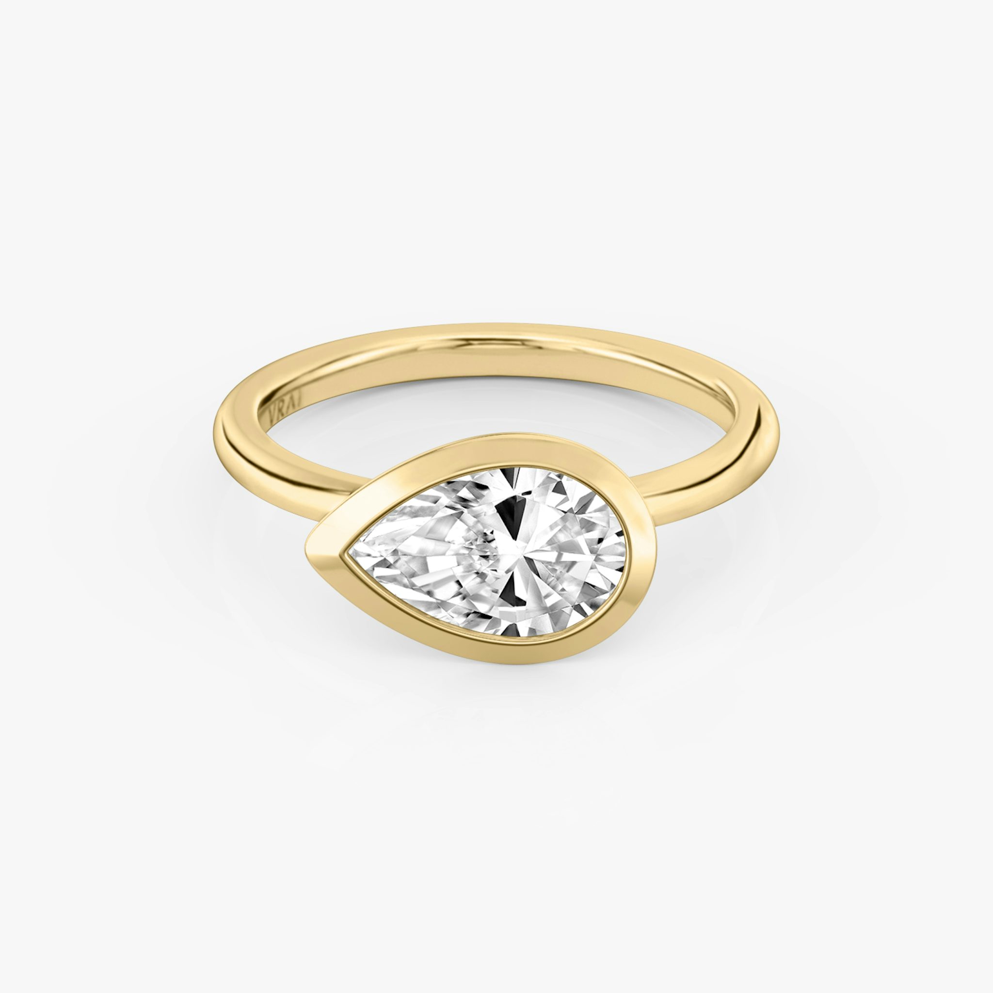 The Signature Bezel | Pear | 18k | Yellow Gold | bandAccent: Plain | diamondOrientation: horizontal | caratWeight: other