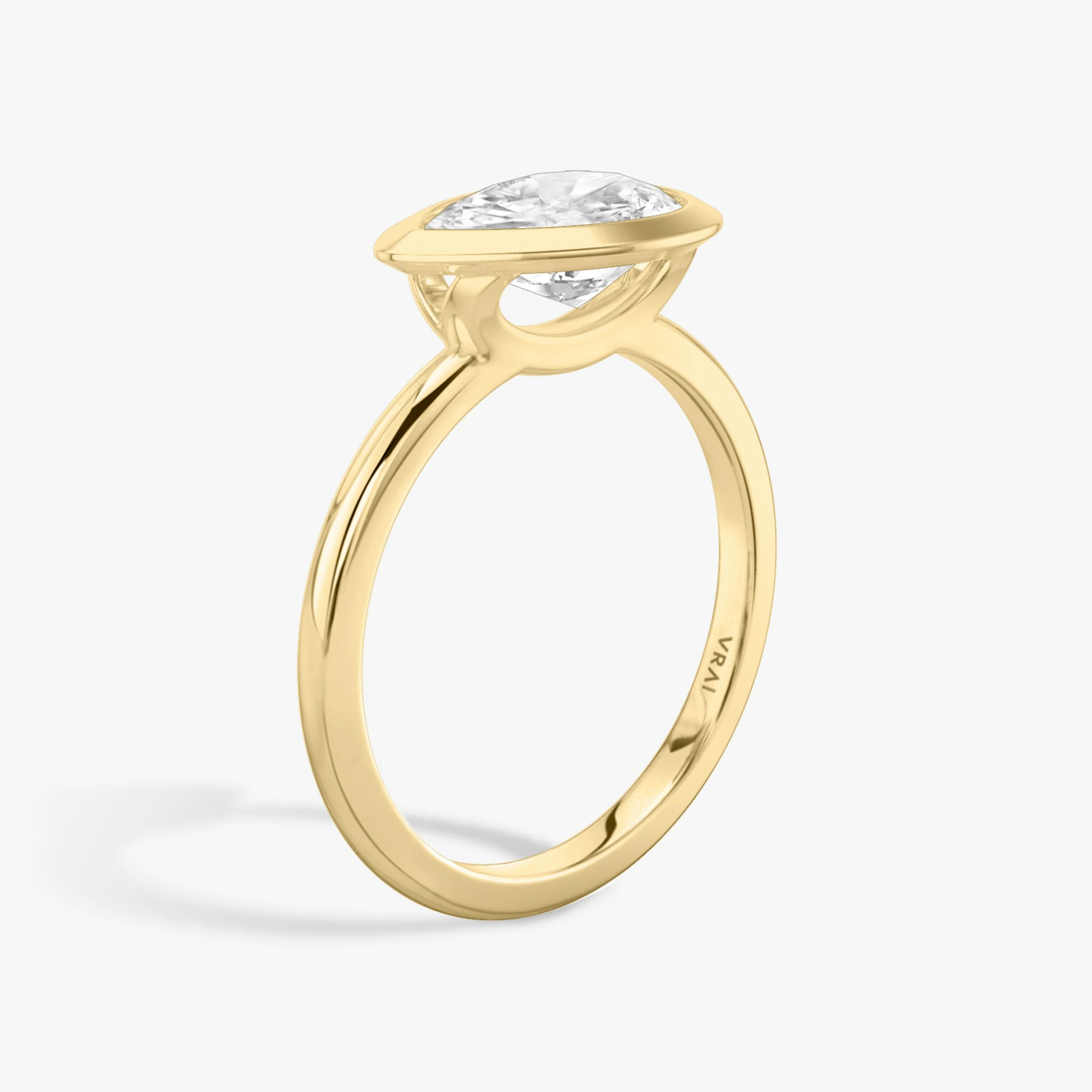 The Signature Bezel | Pear | 18k | Yellow Gold | bandAccent: Plain | diamondOrientation: horizontal | caratWeight: other