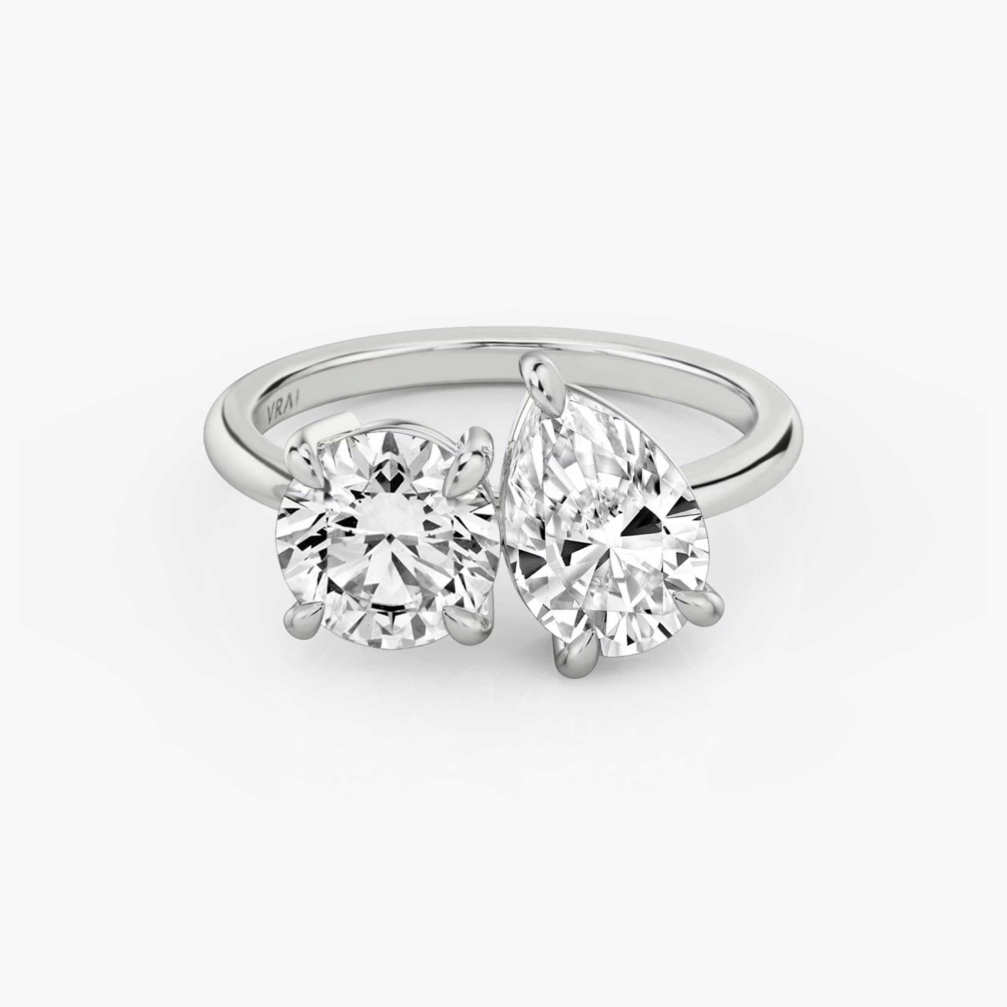 The Toi et Moi | Round Brilliant and Pear | Platinum | bandAccent: Plain | diamondOrientation: vertical | caratWeight: other
