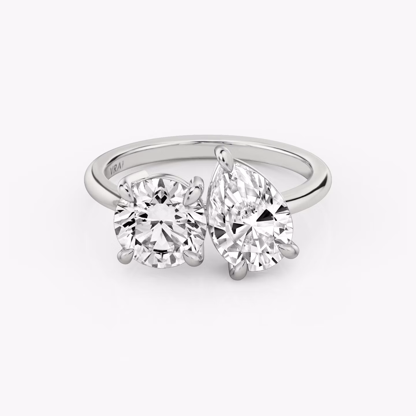 The Toi et Moi | Round Brilliant and Pear | Platinum | bandAccent: Plain | diamondOrientation: vertical | caratWeight: other