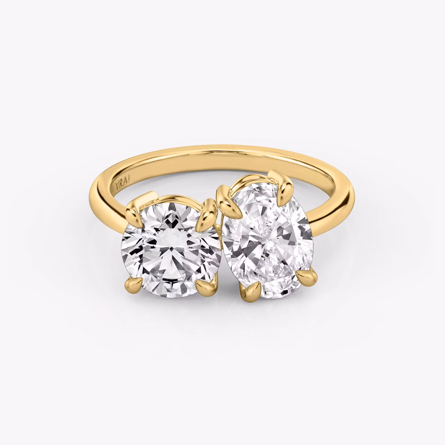 The Toi et Moi Round Brilliant and Oval | Yellow Gold