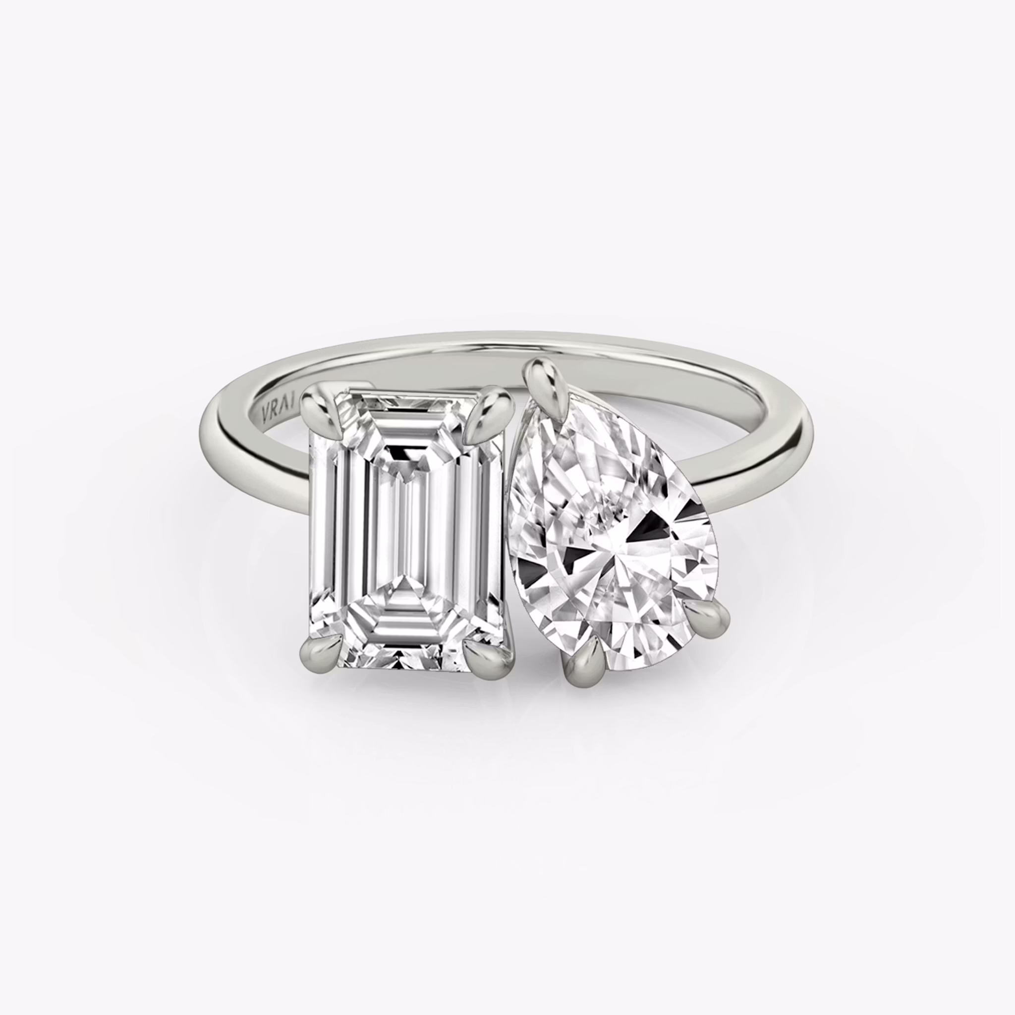 The Toi et Moi Emerald and Pear | Platinum