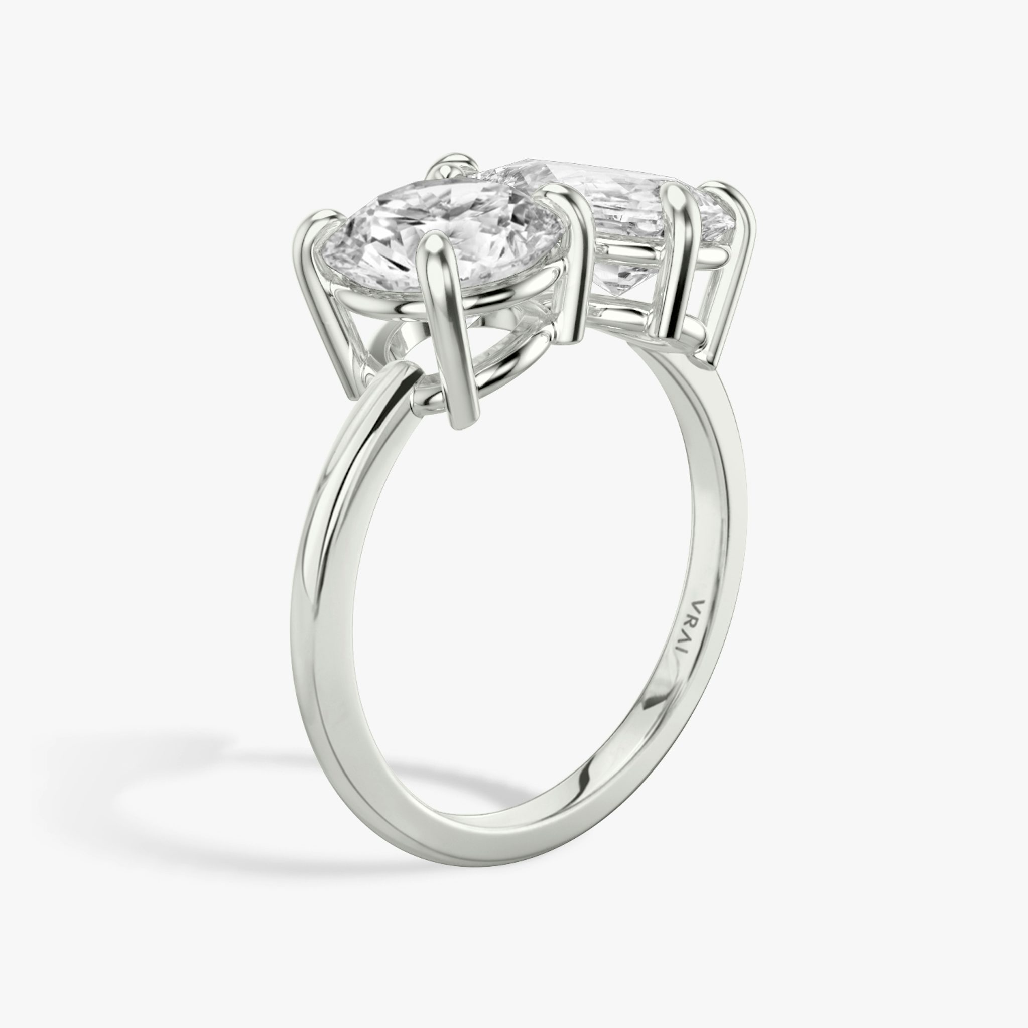 The Toi et Moi | Round Brilliant and Pear | Platinum | bandAccent: Plain | diamondOrientation: vertical | caratWeight: other