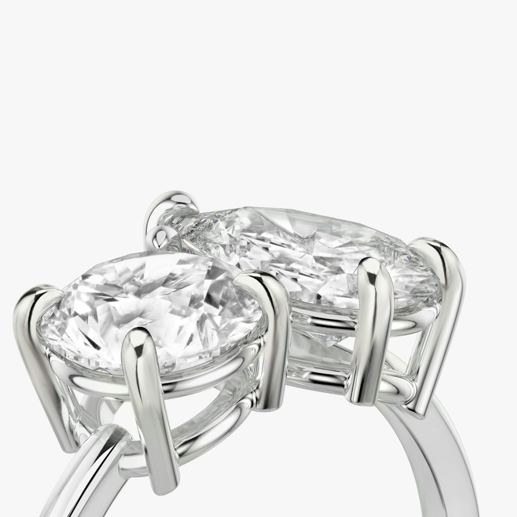 The Toi et Moi | Round Brilliant and Pear | Platinum | bandAccent: Plain | diamondOrientation: vertical | caratWeight: other