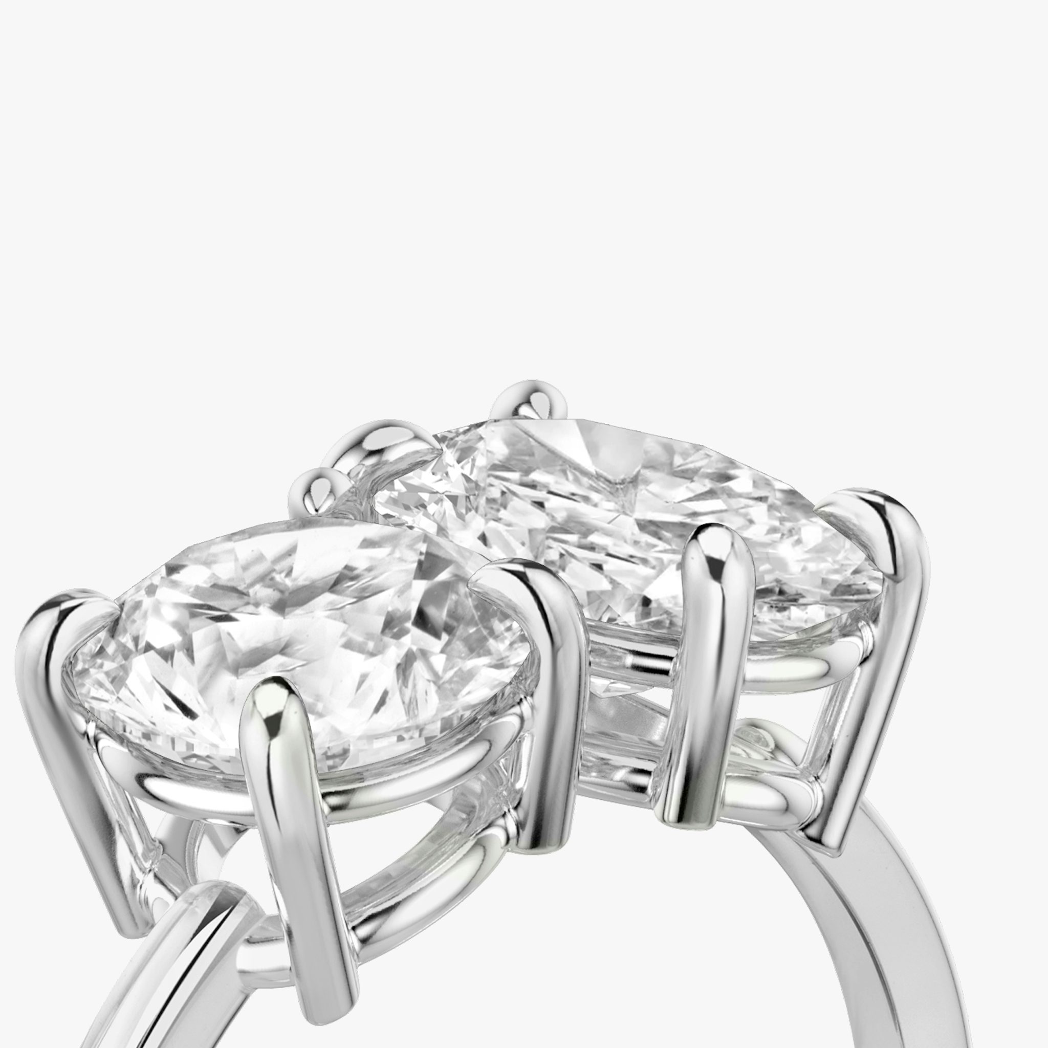 The Toi et Moi | Round Brilliant and Oval | Platinum | bandAccent: Plain | diamondOrientation: vertical | caratWeight: other