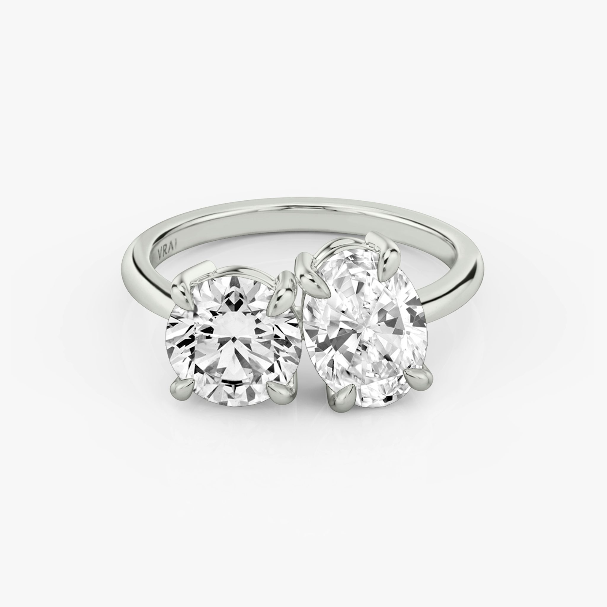 The Toi et Moi | Round Brilliant and Oval | Platinum | bandAccent: Plain | diamondOrientation: vertical | caratWeight: other