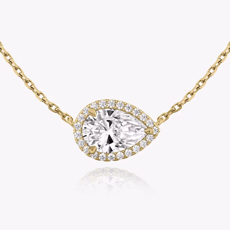 halo pear diamond necklace yellow gold