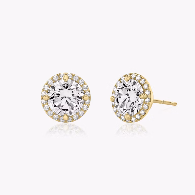 0.40ct round brilliant diamond stud in yellow gold with halo setting, enhancing sparkle in elegant fine jewelry design.