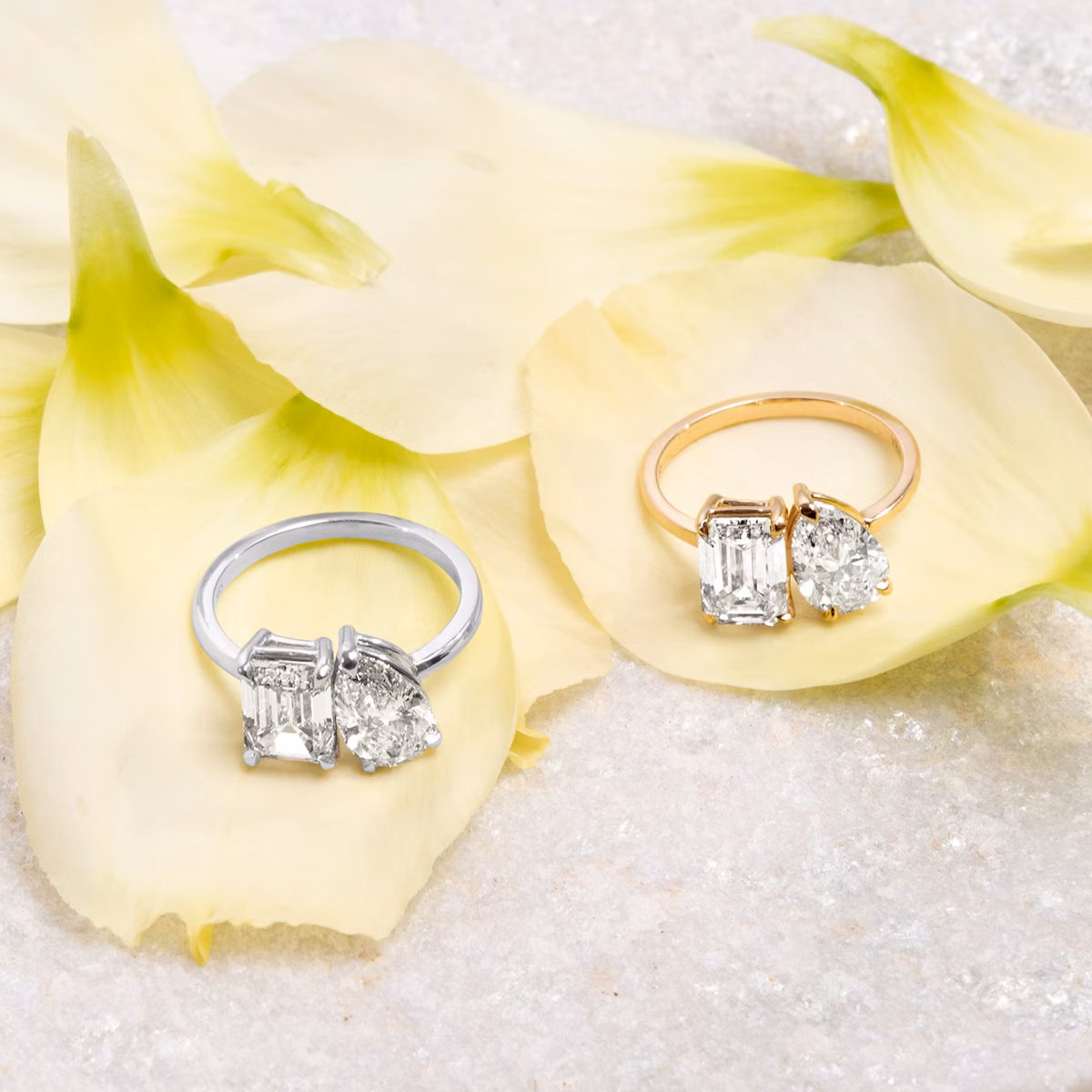 The Toi et Moi | Emerald and Pear | Platinum | bandAccent: Plain | diamondOrientation: vertical | caratWeight: other