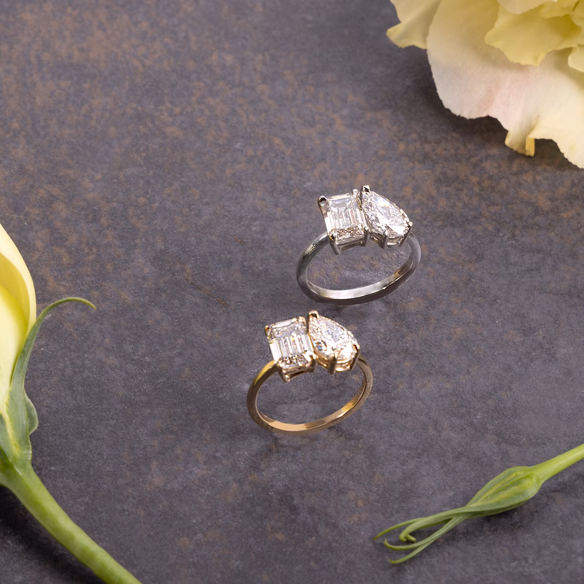 The Toi et Moi | Emerald and Pear | Platinum | bandAccent: Plain | diamondOrientation: vertical | caratWeight: other