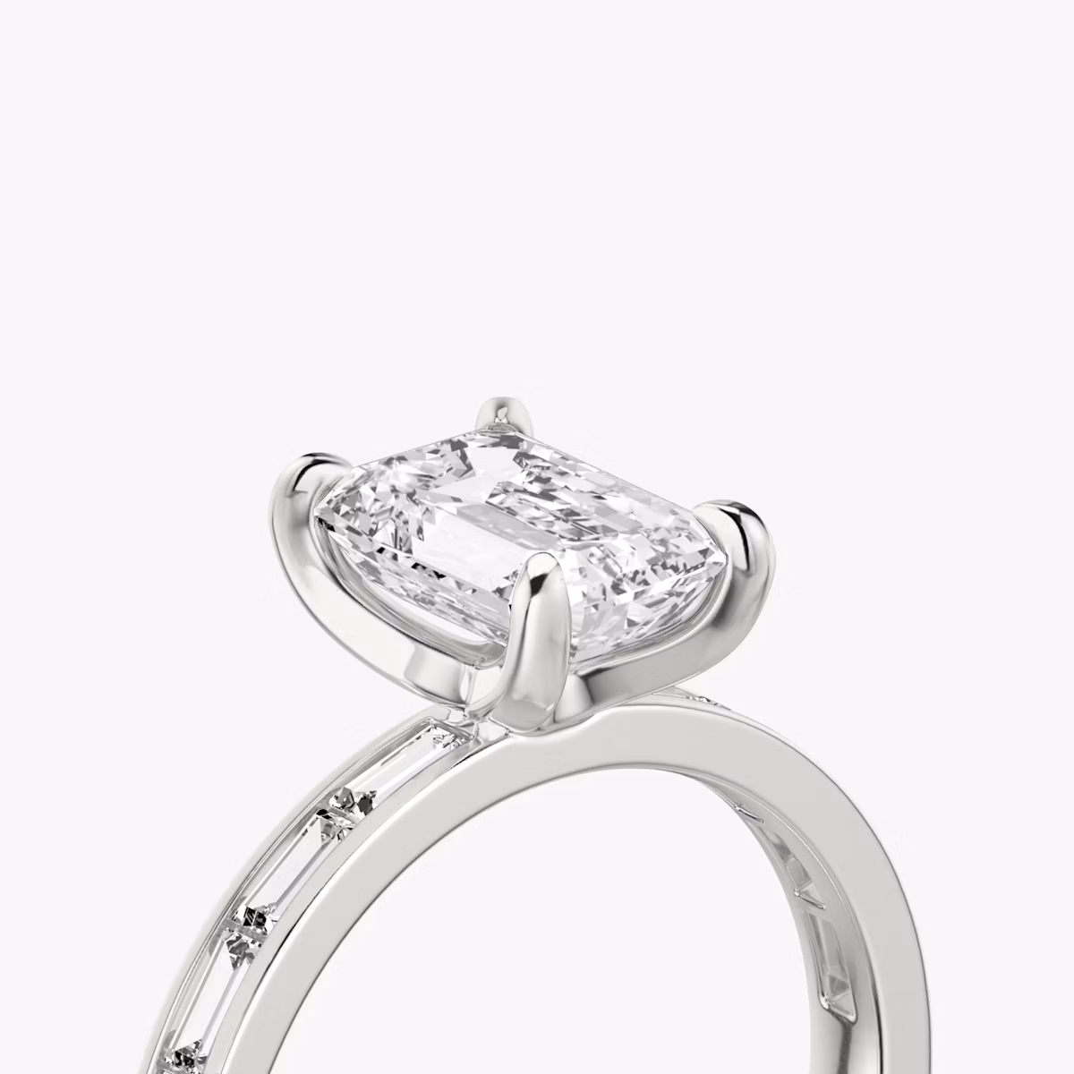The Devotion | Emerald | Platinum | bandAccent: Pavé | bandStoneShape: Baguette | bandStoneStyle: original | diamondOrientation: vertical | caratWeight: other
