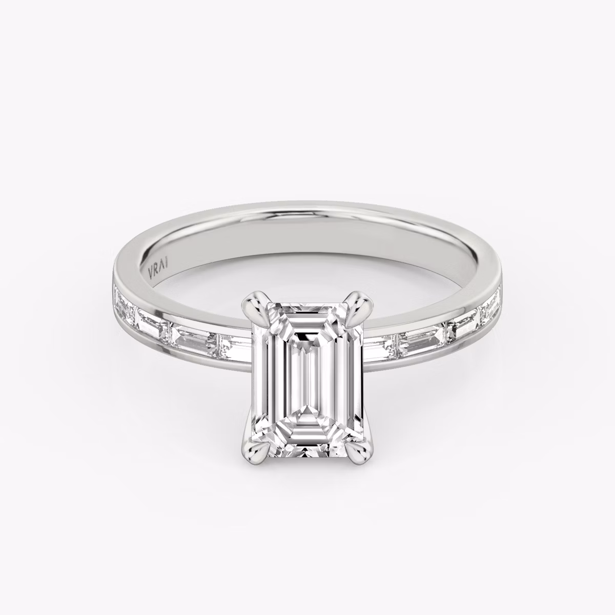 The Devotion | Emerald | Platinum | bandAccent: Pavé | bandStoneShape: Baguette | bandStoneStyle: original | diamondOrientation: vertical | caratWeight: other