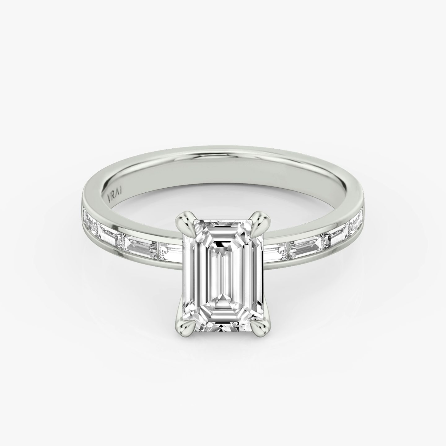 The Devotion | Emerald | Platinum | bandAccent: Pavé | bandStoneShape: Baguette | bandStoneStyle: original | diamondOrientation: vertical | caratWeight: other