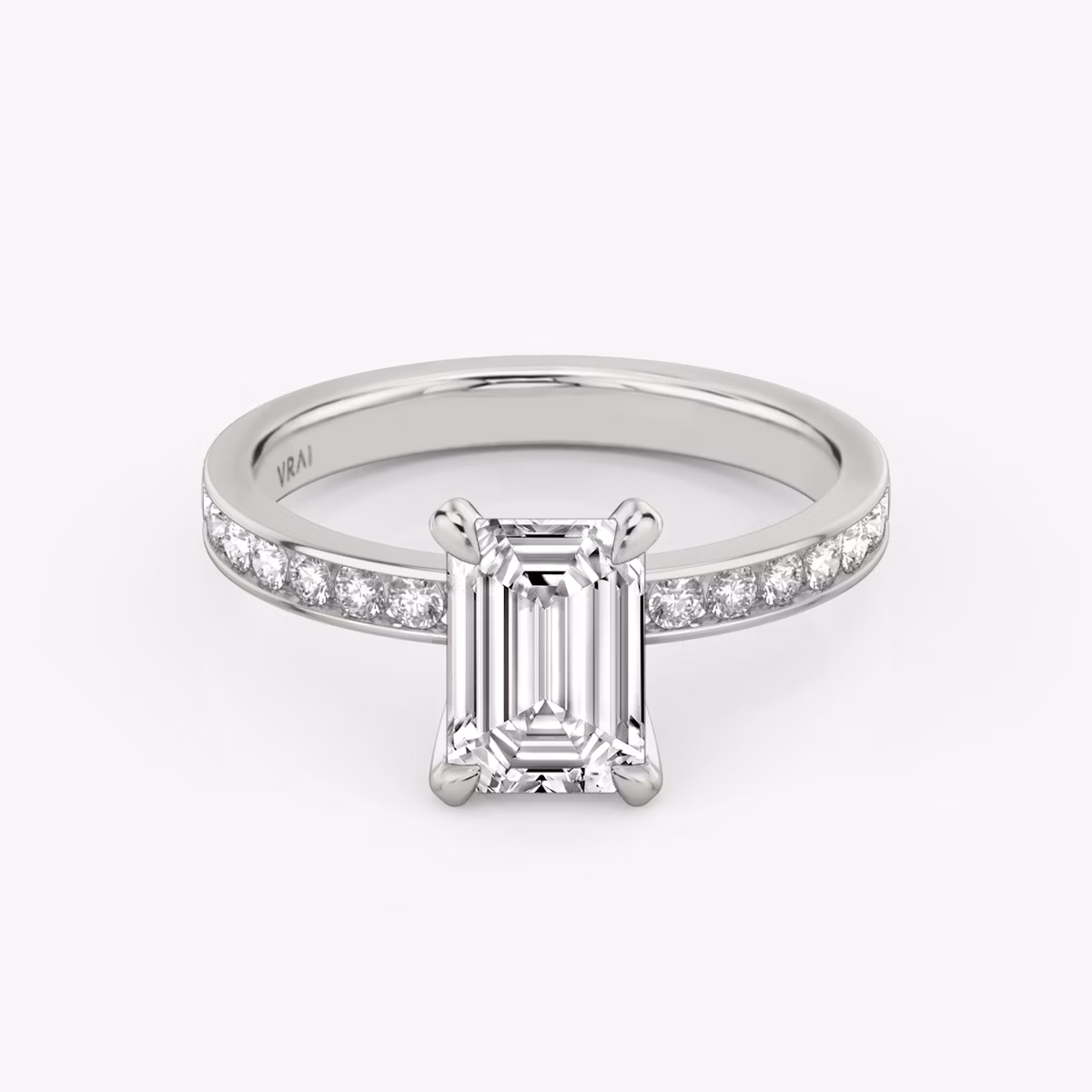 The Devotion | Emerald | 18k | White Gold | bandAccent: Pavé | bandStoneShape: Round Brilliant | bandStoneStyle: large | diamondOrientation: vertical | caratWeight: other