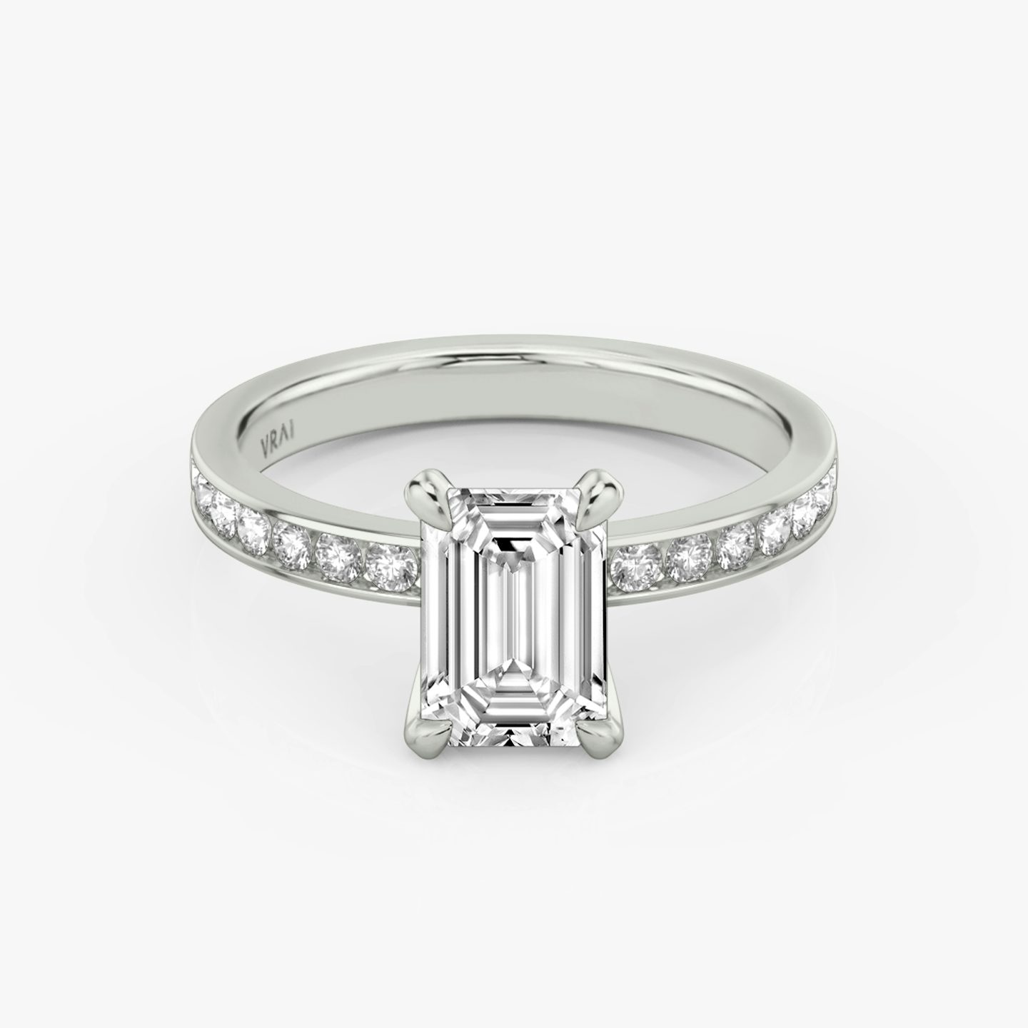 The Devotion | Emerald | 18k | White Gold | bandAccent: Pavé | bandStoneShape: Round Brilliant | bandStoneStyle: large | diamondOrientation: vertical | caratWeight: other