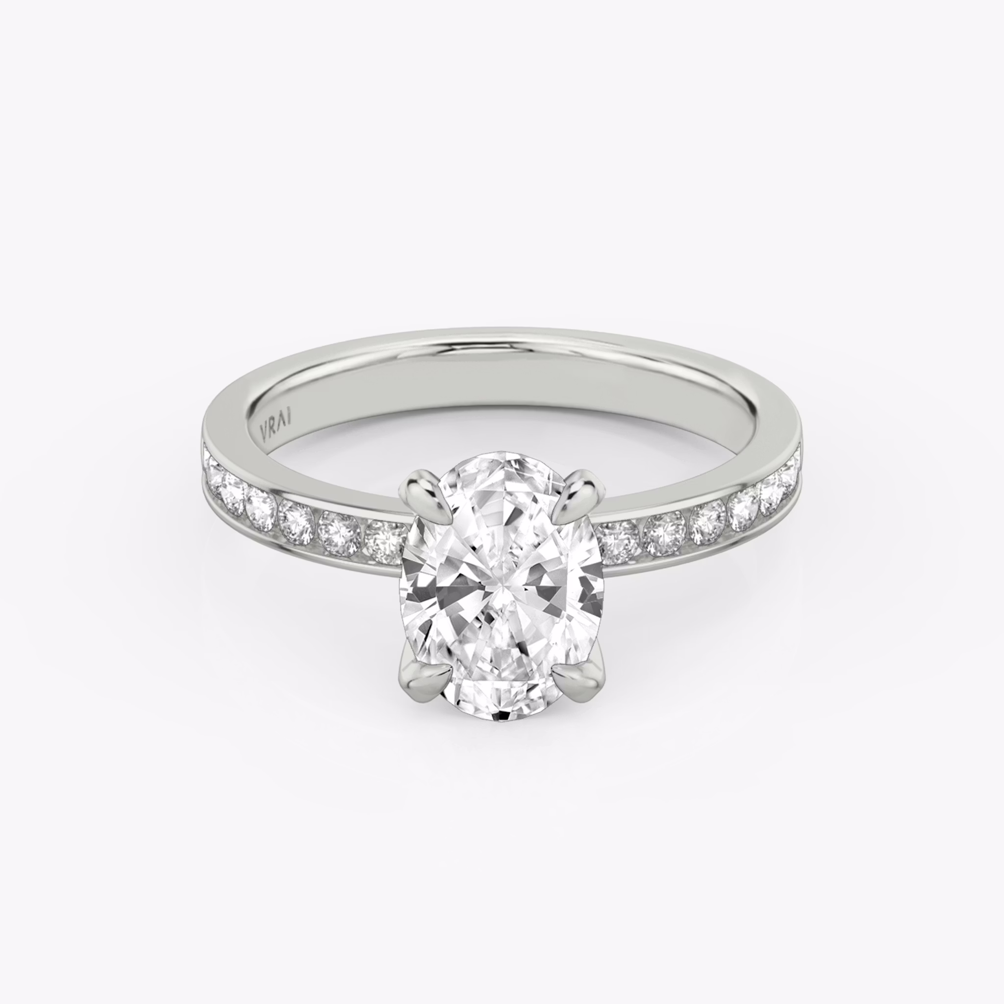 The Devotion | Oval | 18k | White Gold | bandAccent: Pavé | bandStoneShape: Round Brilliant | bandStoneStyle: large | diamondOrientation: vertical | caratWeight: other