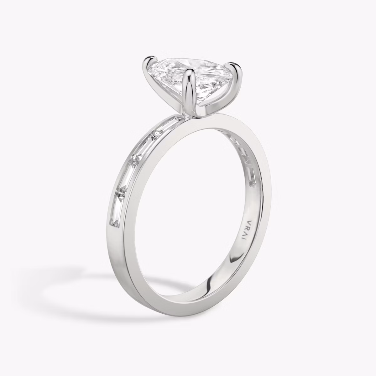 The Devotion | Pear | Platinum | bandAccent: Pavé | bandStoneShape: Baguette | bandStoneStyle: original | diamondOrientation: vertical | caratWeight: other