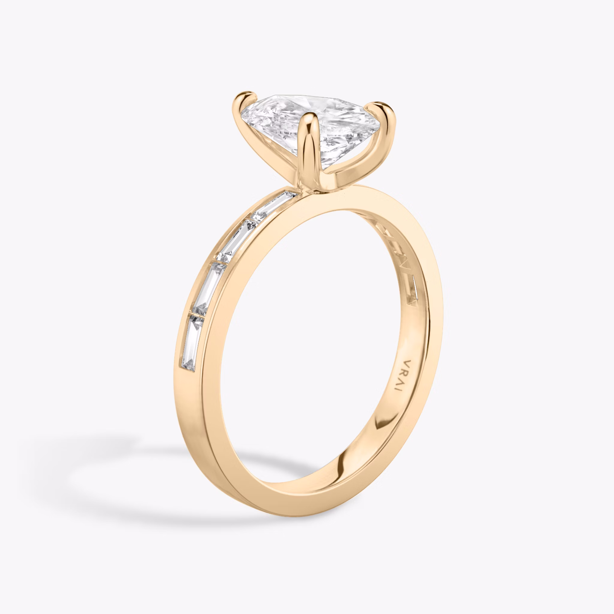 The Devotion | Pear | 14k | Rose Gold | bandAccent: Pavé | bandStoneShape: Baguette | bandStoneStyle: original | diamondOrientation: vertical | caratWeight: other
