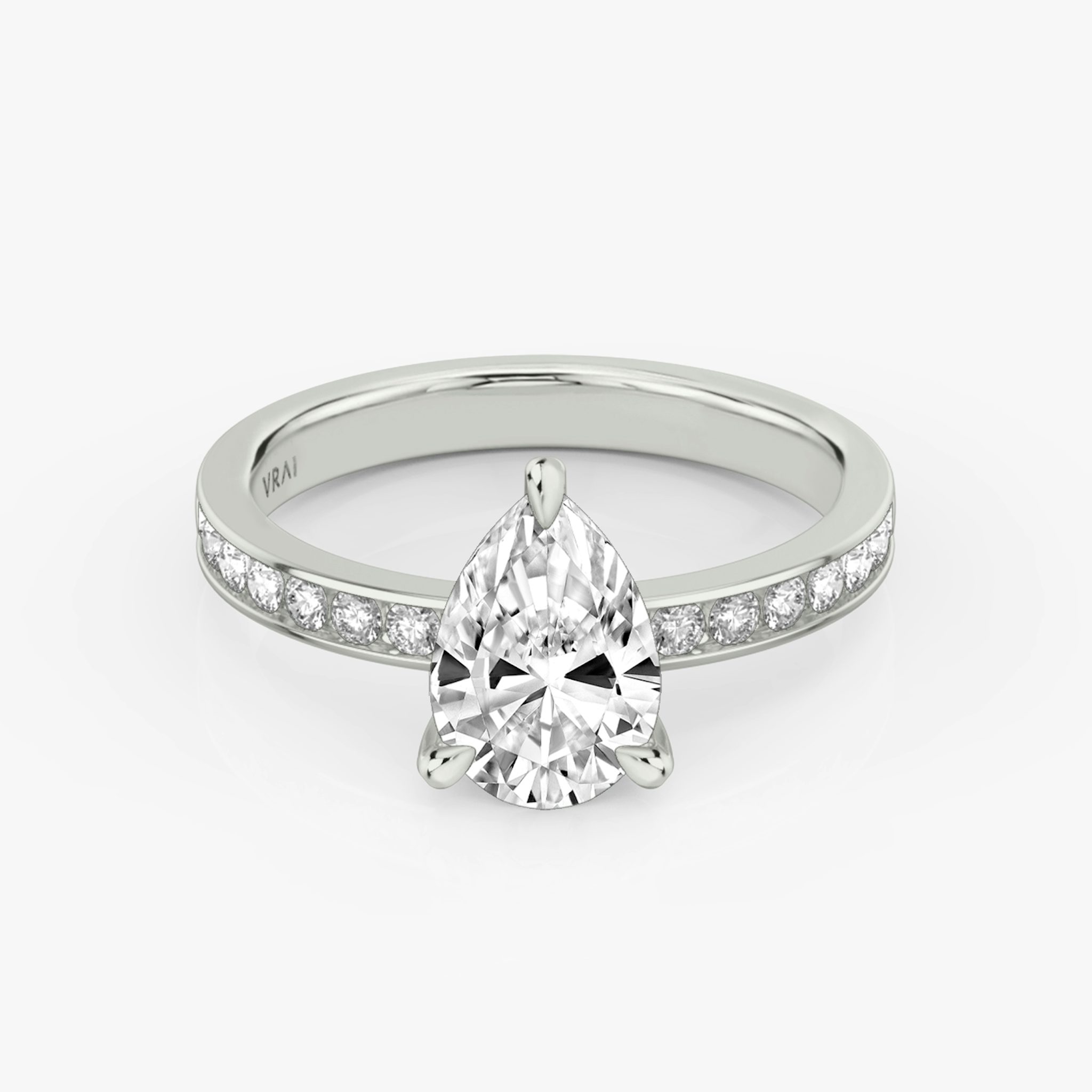 The Devotion | Pear | 18k | White Gold | bandAccent: Pavé | bandStoneShape: Round Brilliant | bandStoneStyle: large | diamondOrientation: vertical | caratWeight: other