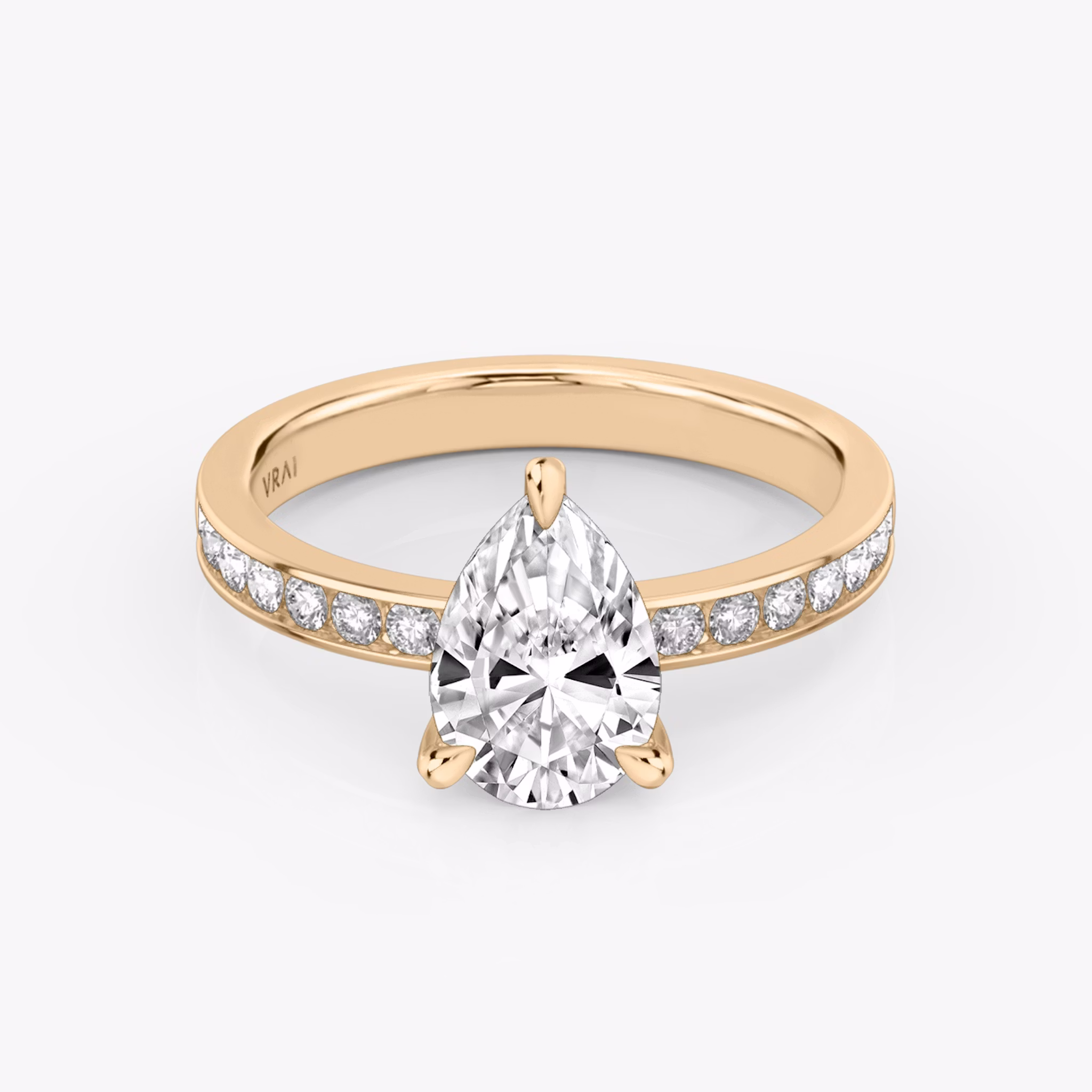 The Devotion | Pear | 14k | Rose Gold | bandAccent: Pavé | bandStoneShape: Round Brilliant | bandStoneStyle: large | diamondOrientation: vertical | caratWeight: other