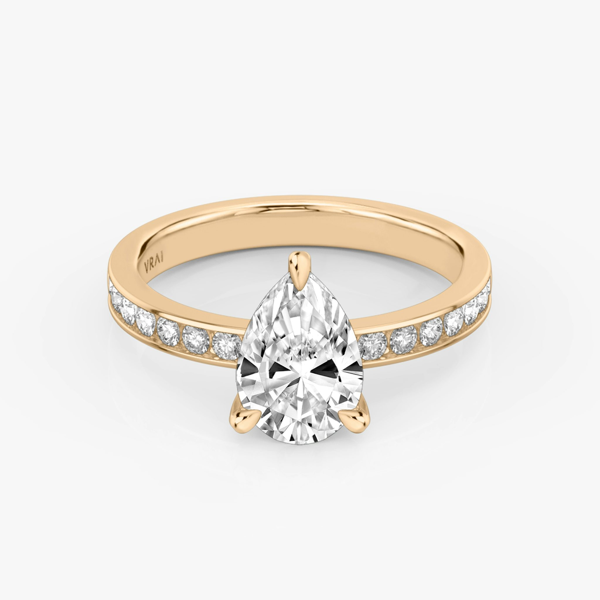 The Devotion | Pear | 14k | Rose Gold | bandAccent: Pavé | bandStoneShape: Round Brilliant | bandStoneStyle: large | diamondOrientation: vertical | caratWeight: other