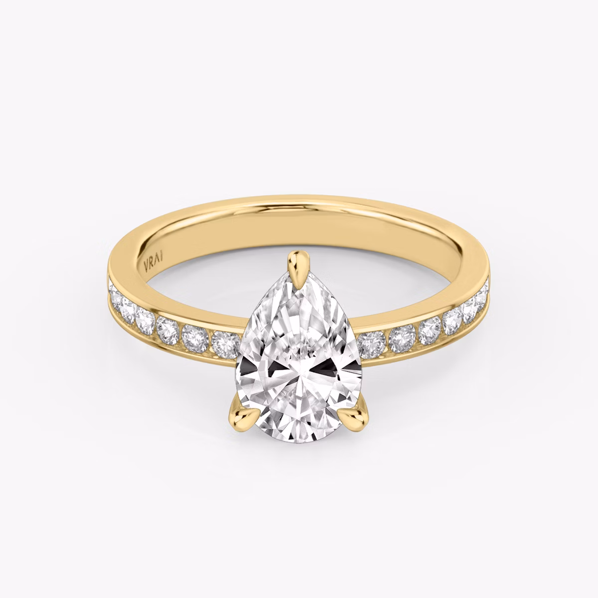 The Devotion | Pear | 18k | Yellow Gold | bandAccent: Pavé | bandStoneShape: Round Brilliant | bandStoneStyle: large | diamondOrientation: vertical | caratWeight: other