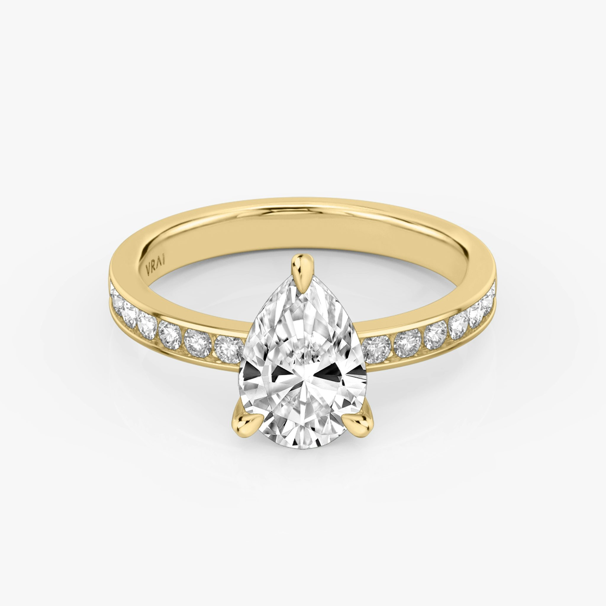 The Devotion | Pear | 18k | Yellow Gold | bandAccent: Pavé | bandStoneShape: Round Brilliant | bandStoneStyle: large | diamondOrientation: vertical | caratWeight: other