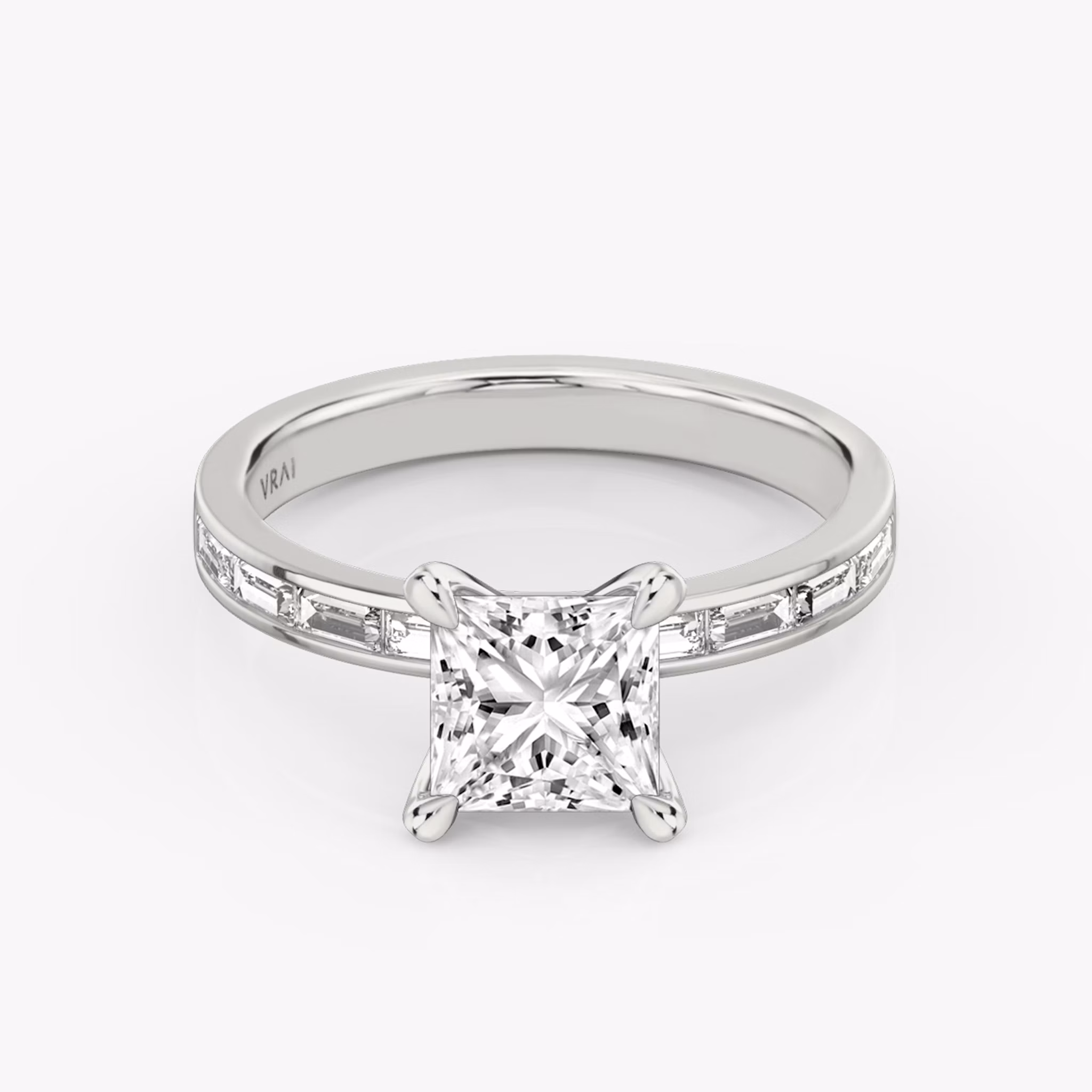 The Devotion Princess White Gold Engagement Ring laying flat.