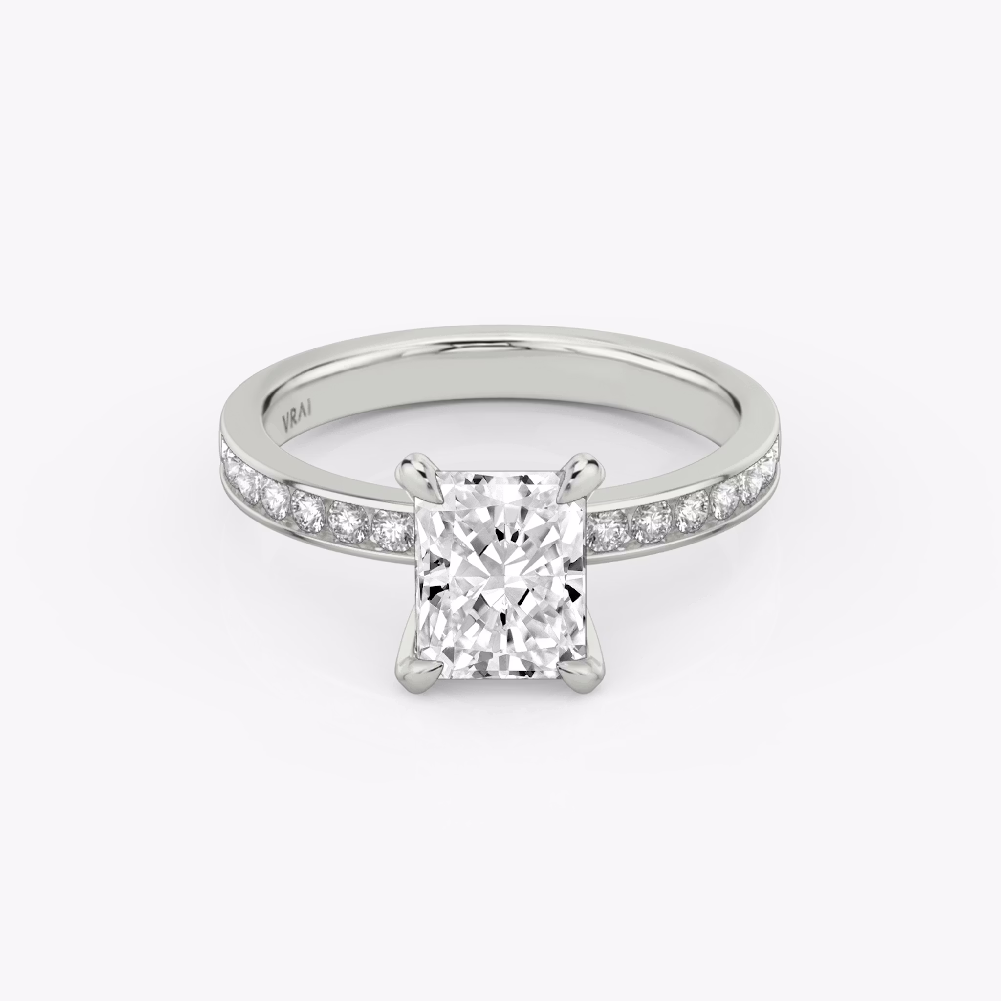 The Devotion | Radiant | Platinum | bandAccent: Pavé | bandStoneShape: Round Brilliant | bandStoneStyle: large | diamondOrientation: vertical | caratWeight: other