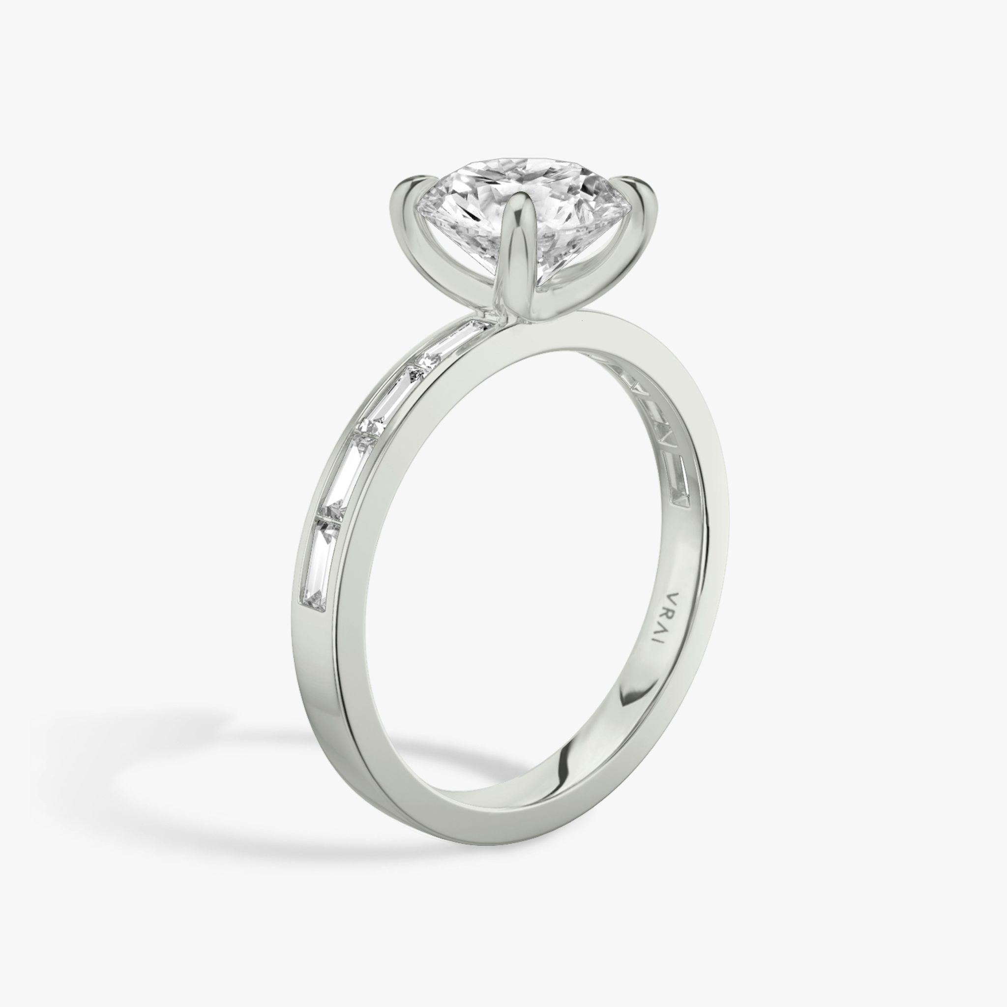 The Devotion | Round Brilliant | Platinum | bandAccent: Pavé | bandStoneShape: Baguette | bandStoneStyle: original | caratWeight: 1.0ct | diamondOrientation: vertical