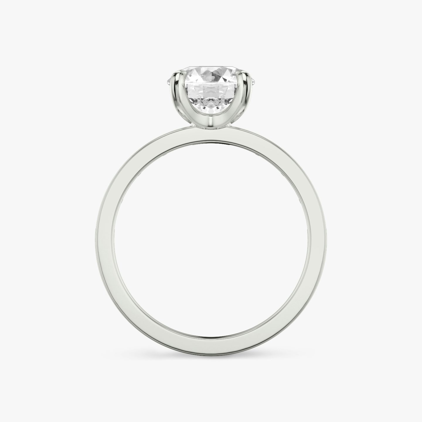 The Devotion | Round Brilliant | 18k | White Gold | bandAccent: Pavé | bandStoneShape: Baguette | bandStoneStyle: original | caratWeight: 2.0ct | diamondOrientation: vertical