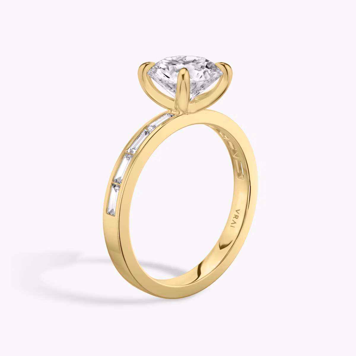 The Devotion | Round Brilliant | 18k | Yellow Gold | bandAccent: Pavé | bandStoneShape: Baguette | bandStoneStyle: original | caratWeight: 1.0ct | diamondOrientation: vertical