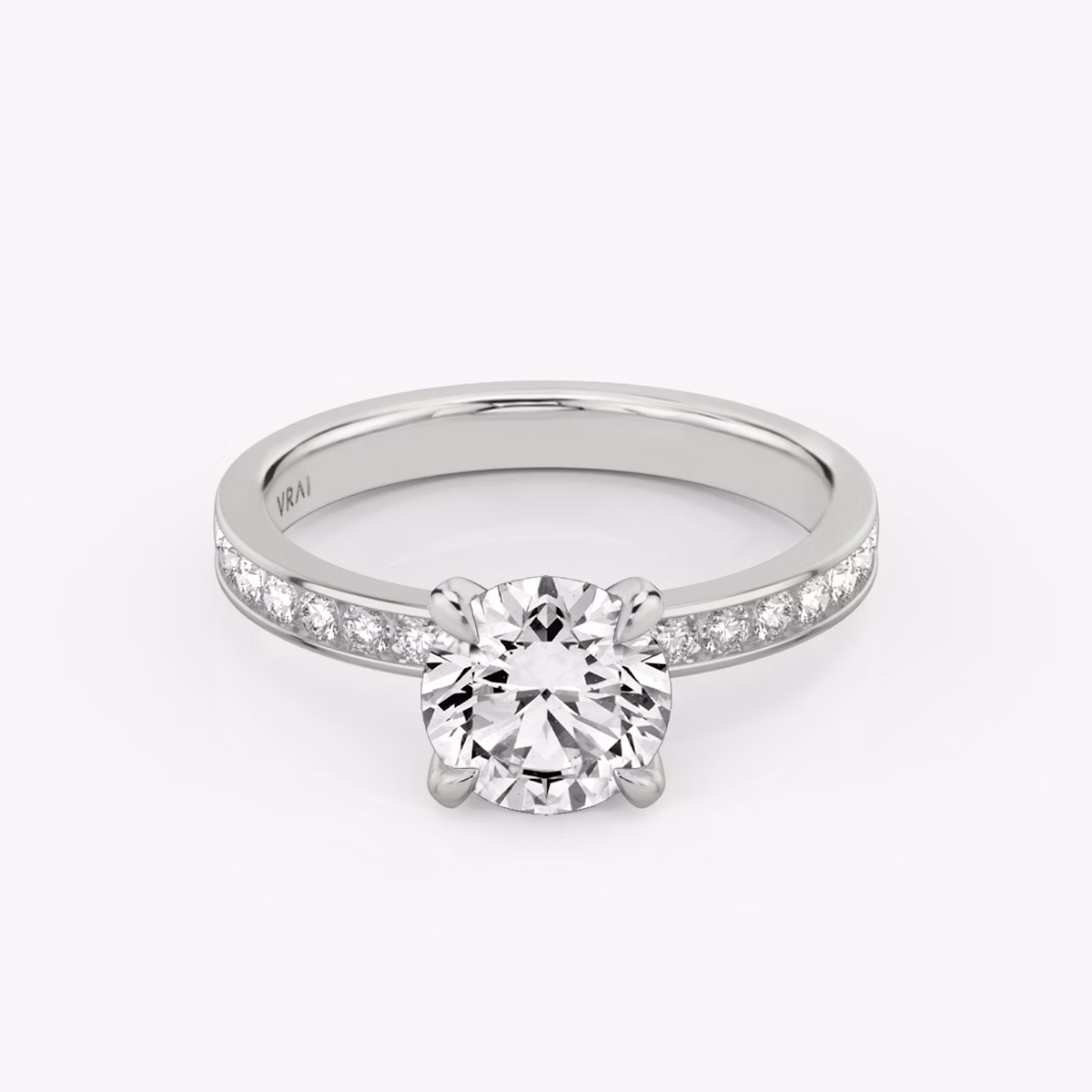 The Devotion | Round Brilliant | Platinum | bandAccent: Pavé | bandStoneShape: Round Brilliant | bandStoneStyle: large | caratWeight: other | diamondOrientation: vertical