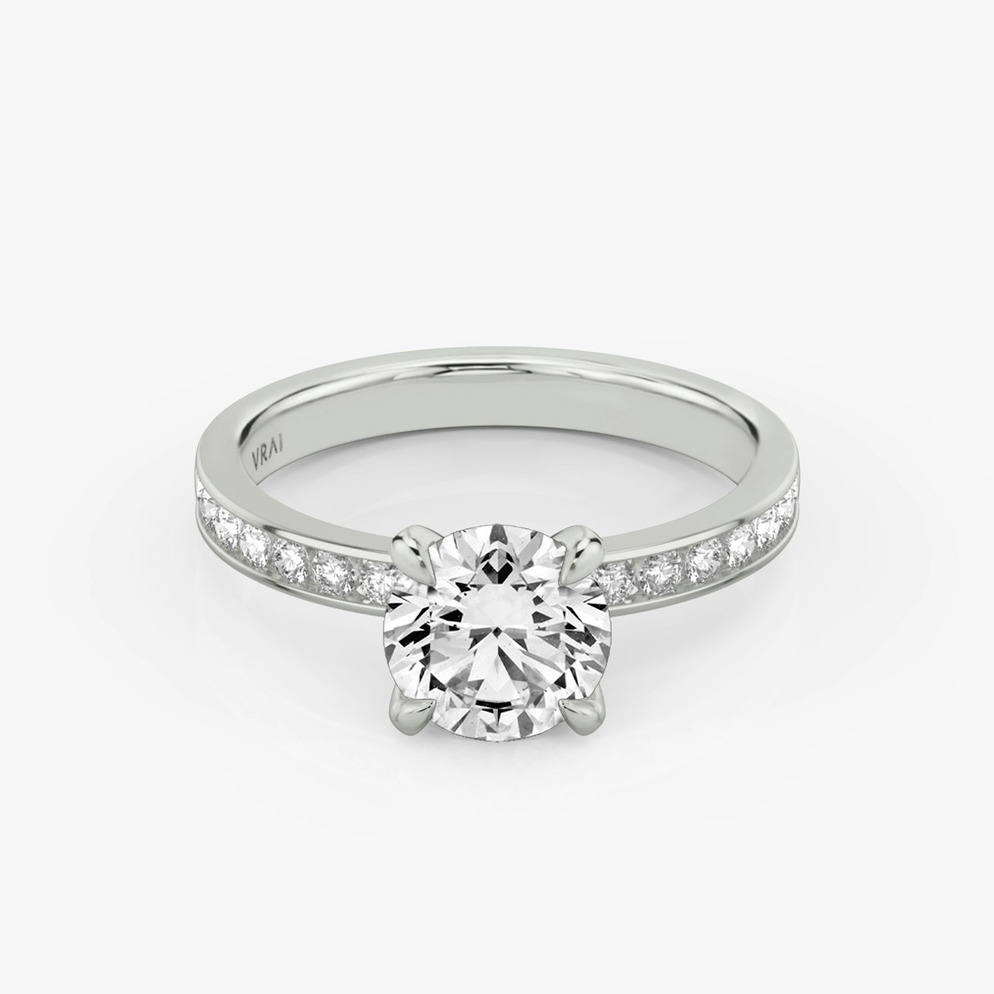 The Devotion | Round Brilliant | 18k | White Gold | bandAccent: Pavé | bandStoneShape: Round Brilliant | bandStoneStyle: large | caratWeight: 1.0ct | diamondOrientation: vertical