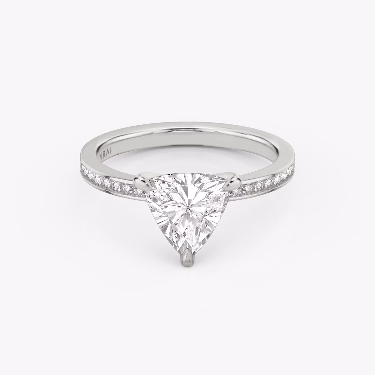 The Devotion | Trillion | Platinum | bandAccent: Pavé | bandStoneShape: Round Brilliant | bandStoneStyle: original | diamondOrientation: vertical | caratWeight: other