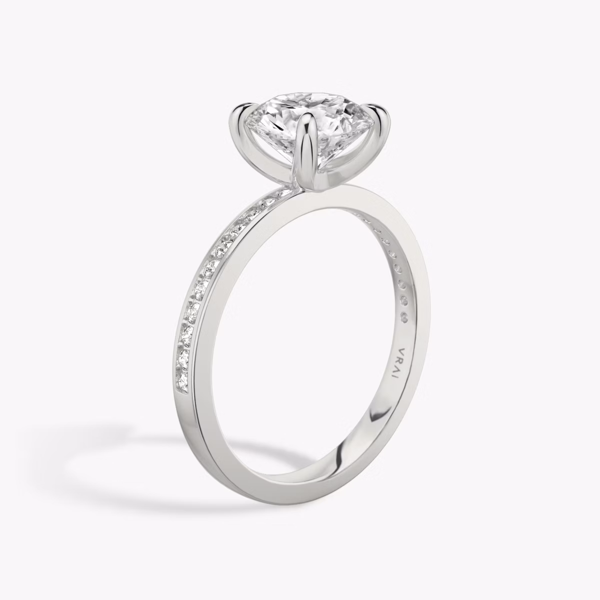 The Devotion | Round Brilliant | 18k | White Gold | bandAccent: Pavé | bandStoneShape: Round Brilliant | bandStoneStyle: original | caratWeight: 1.5ct | diamondOrientation: vertical