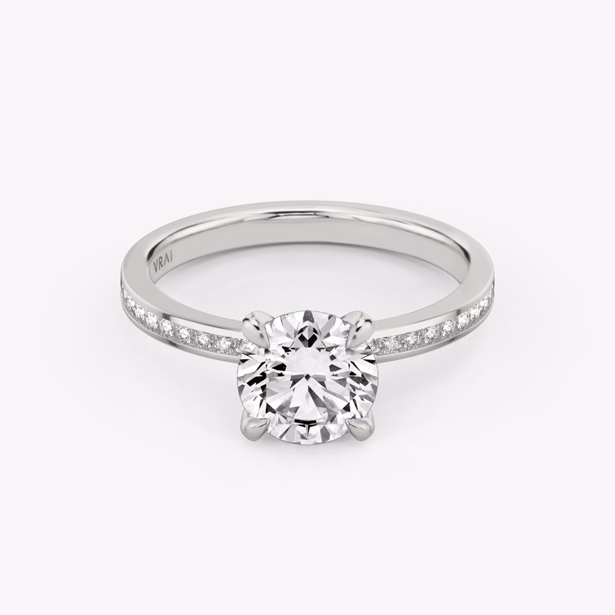 The Devotion | Round Brilliant | 18k | White Gold | bandAccent: Pavé | bandStoneShape: Round Brilliant | bandStoneStyle: original | caratWeight: 1.5ct | diamondOrientation: vertical