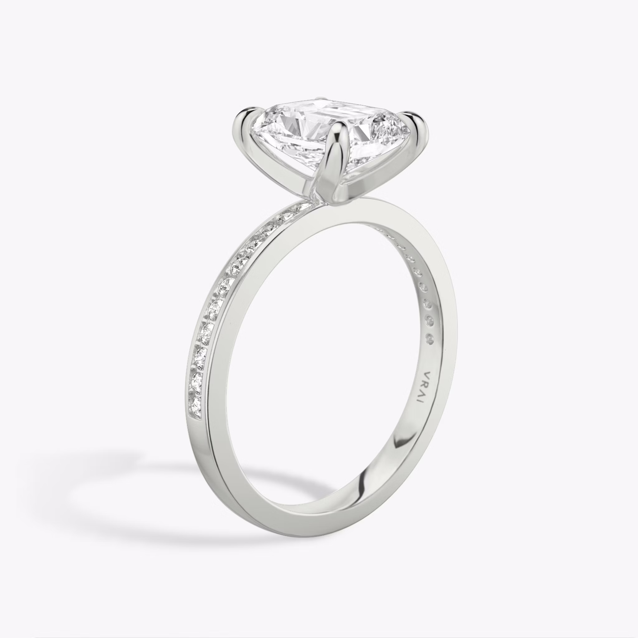 The Devotion | Radiant | 18k | White Gold | bandAccent: Pavé | bandStoneShape: Round Brilliant | bandStoneStyle: original | diamondOrientation: vertical | caratWeight: other