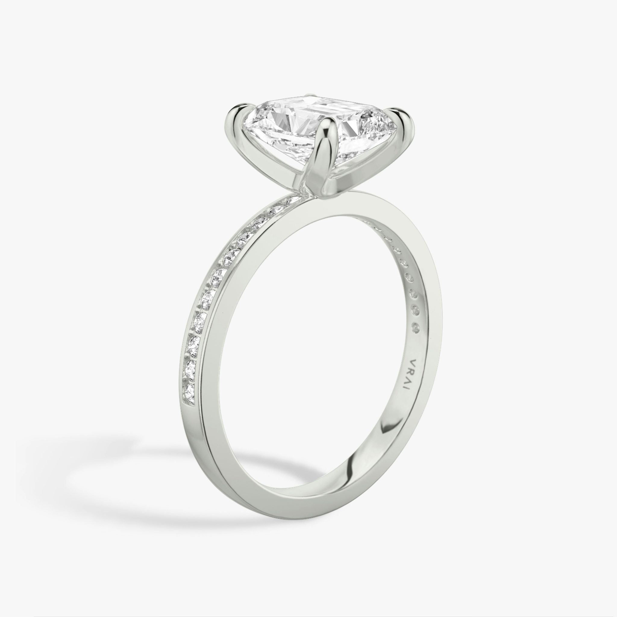 The Devotion | Radiant | 18k | White Gold | bandAccent: Pavé | bandStoneShape: Round Brilliant | bandStoneStyle: original | diamondOrientation: vertical | caratWeight: other