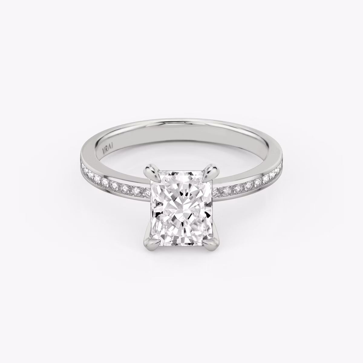 The Devotion | Radiant | Platinum | bandAccent: Pavé | bandStoneShape: Round Brilliant | bandStoneStyle: original | diamondOrientation: vertical | caratWeight: other
