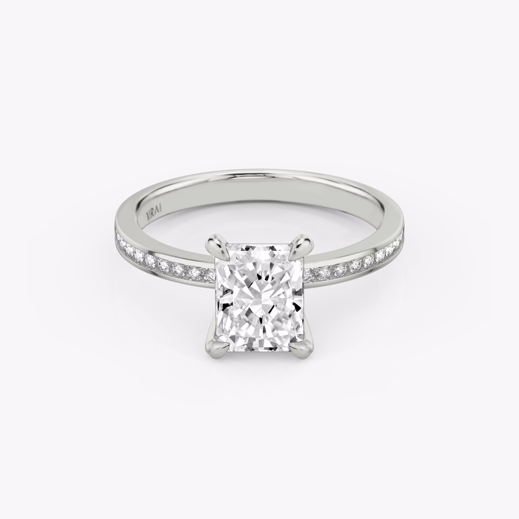 The Devotion | Radiant | 18k | White Gold | bandAccent: Pavé | bandStoneShape: Round Brilliant | bandStoneStyle: original | diamondOrientation: vertical | caratWeight: other