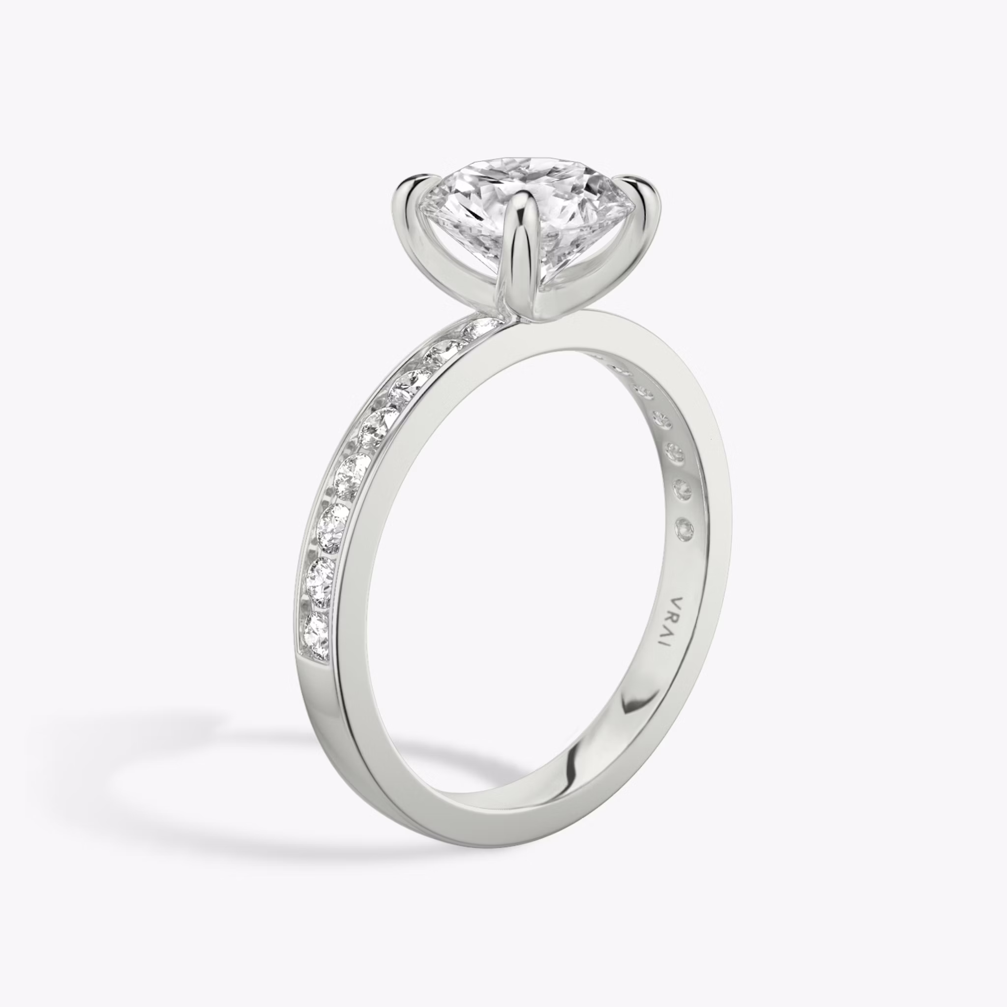 The Devotion | Round Brilliant | 18k | White Gold | bandAccent: Pavé | bandStoneShape: Round Brilliant | bandStoneStyle: large | caratWeight: 2.0ct | diamondOrientation: vertical