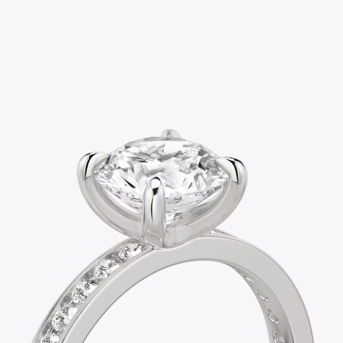 The Devotion | Round Brilliant | Platinum | bandAccent: Pavé | bandStoneShape: Round Brilliant | bandStoneStyle: large | caratWeight: other | diamondOrientation: vertical