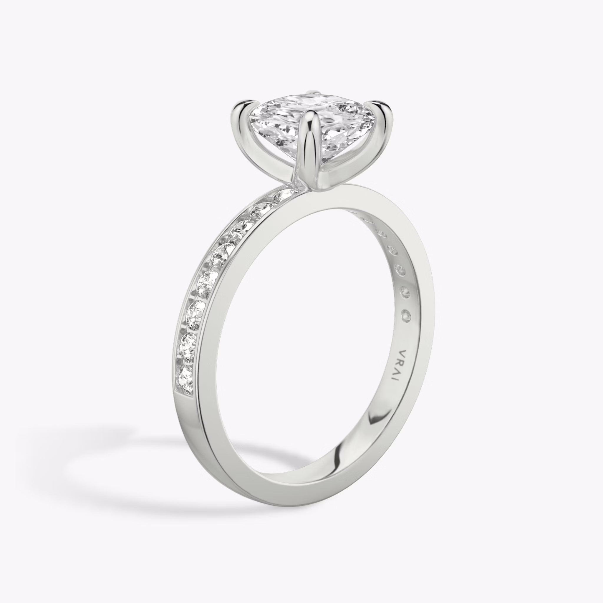 The Devotion | Cushion | Platinum | bandAccent: Pavé | bandStoneShape: Round Brilliant | bandStoneStyle: large | diamondOrientation: vertical | caratWeight: other