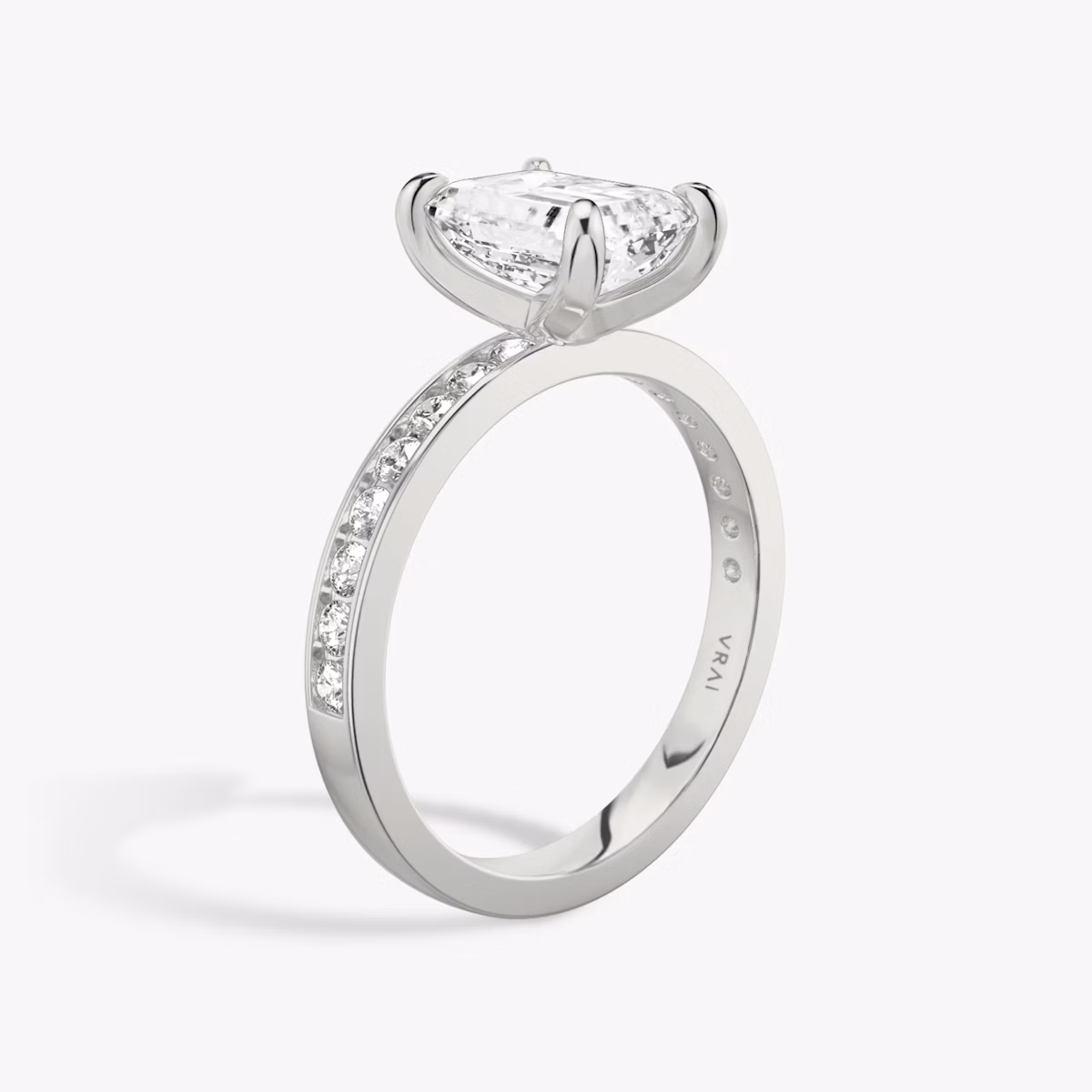 The Devotion | Emerald | 18k | White Gold | bandAccent: Pavé | bandStoneShape: Round Brilliant | bandStoneStyle: large | diamondOrientation: vertical | caratWeight: other