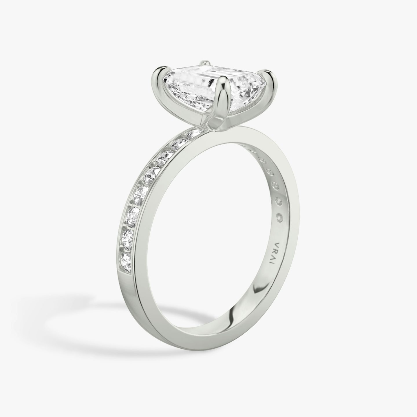 The Devotion | Emerald | 18k | White Gold | bandAccent: Pavé | bandStoneShape: Round Brilliant | bandStoneStyle: large | diamondOrientation: vertical | caratWeight: other