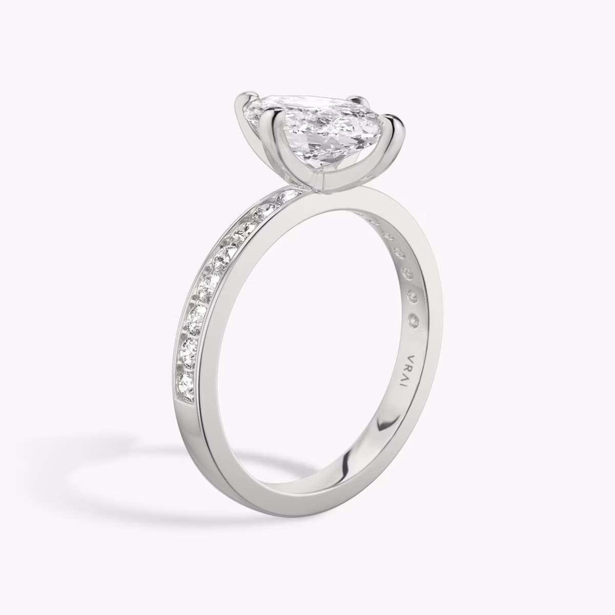 The Devotion | Marquise | 18k | White Gold | bandAccent: Pavé | bandStoneShape: Round Brilliant | bandStoneStyle: large | diamondOrientation: vertical | caratWeight: other