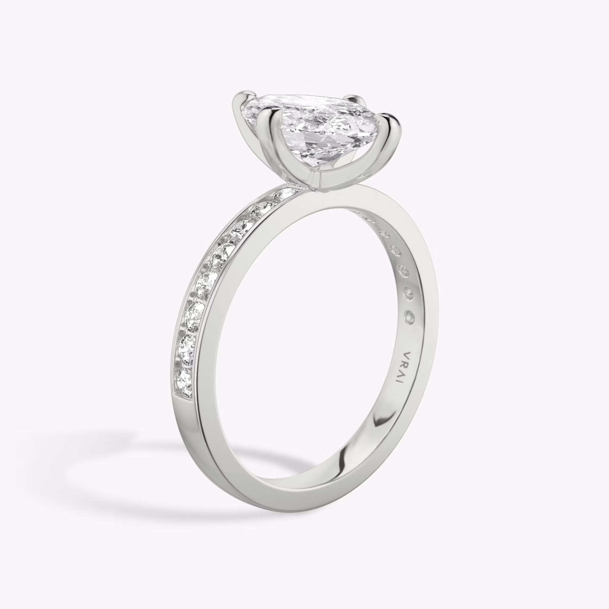 The Devotion | Marquise | 18k | White Gold | bandAccent: Pavé | bandStoneShape: Round Brilliant | bandStoneStyle: large | diamondOrientation: vertical | caratWeight: other